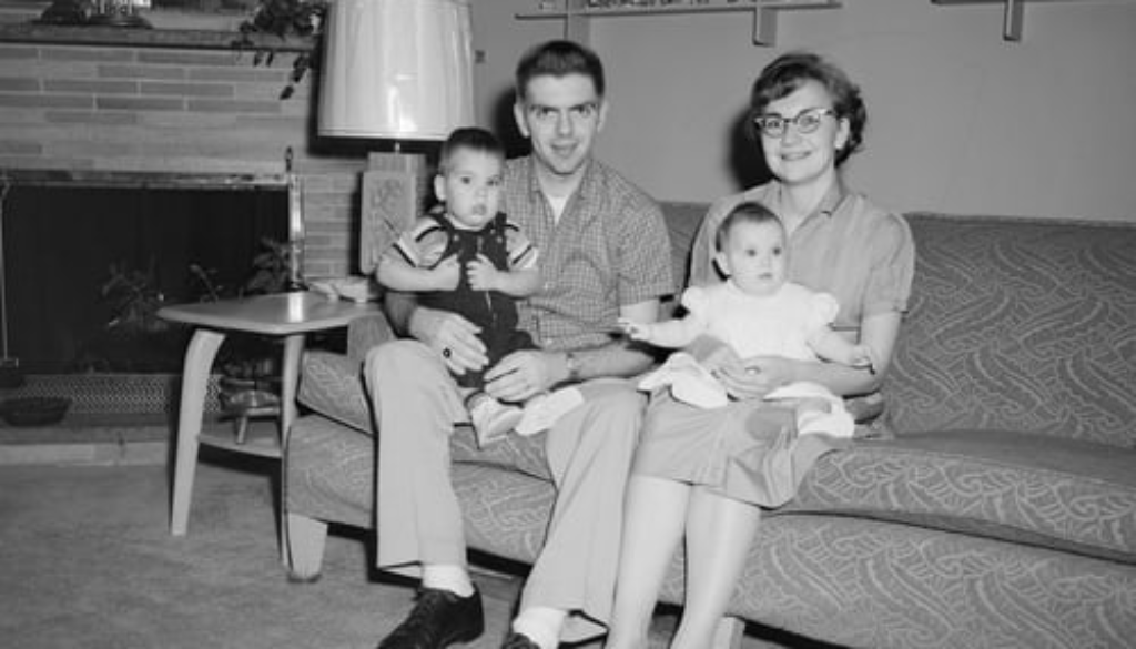 An old image of a couple with two kids
