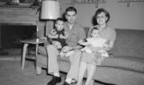 An old image of a couple with two kids