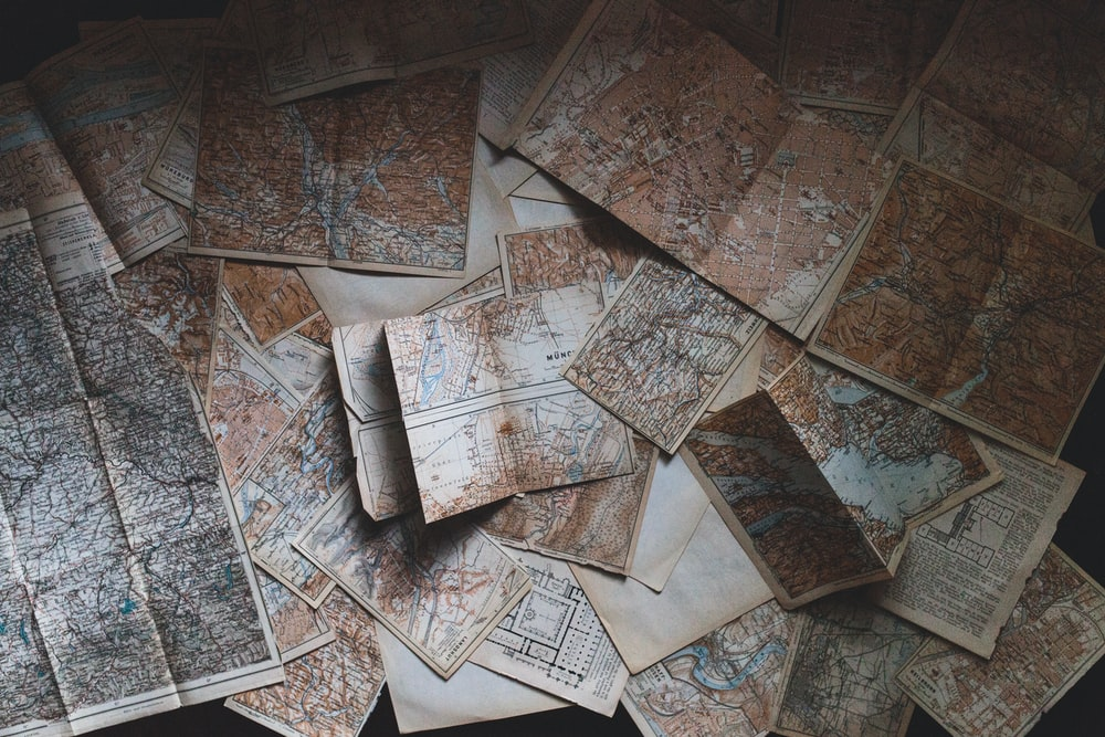 multiple maps lying on the floor
