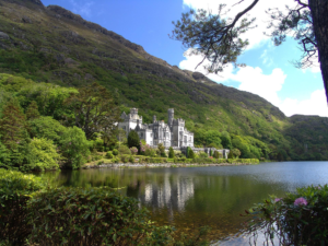 A castle near a river in Ireland