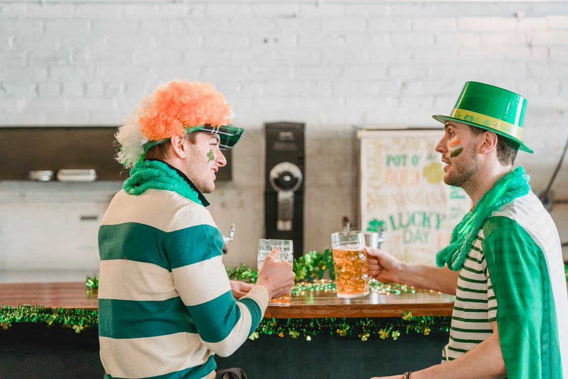 Irish people drinking beer during an Irish ancestry tour 