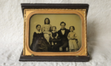 An old, framed family photo.