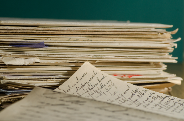 Record files with loose papers.