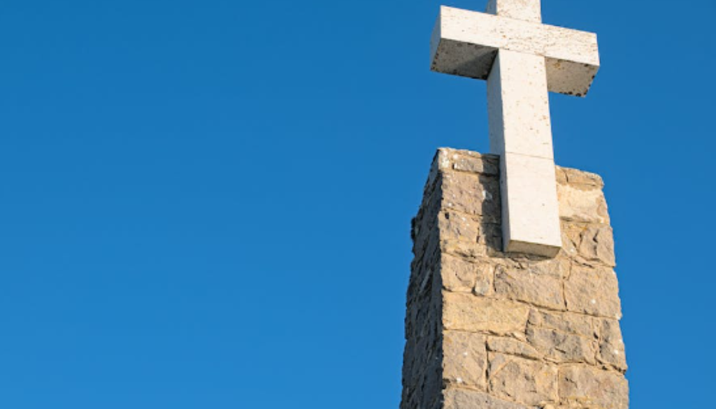 White cross on tower