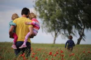 Family in a field of flowers.