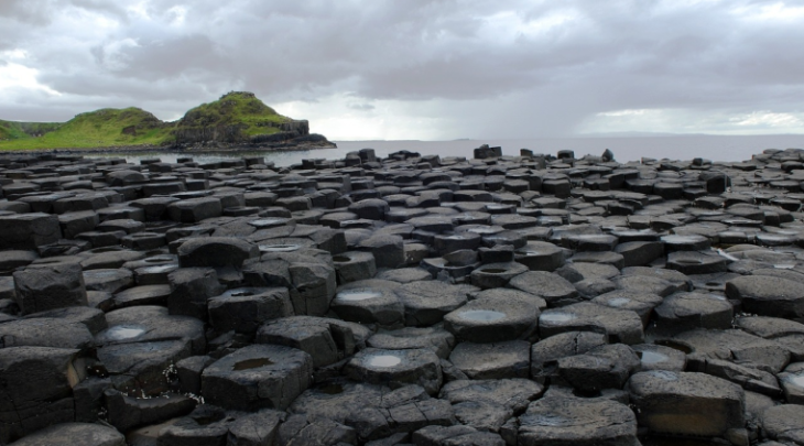 Dark rocks near Irish coastline.