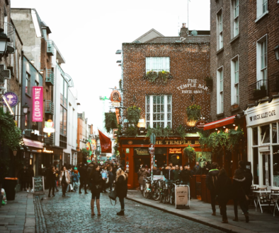 Tourists enjoying Irish festivals and events.