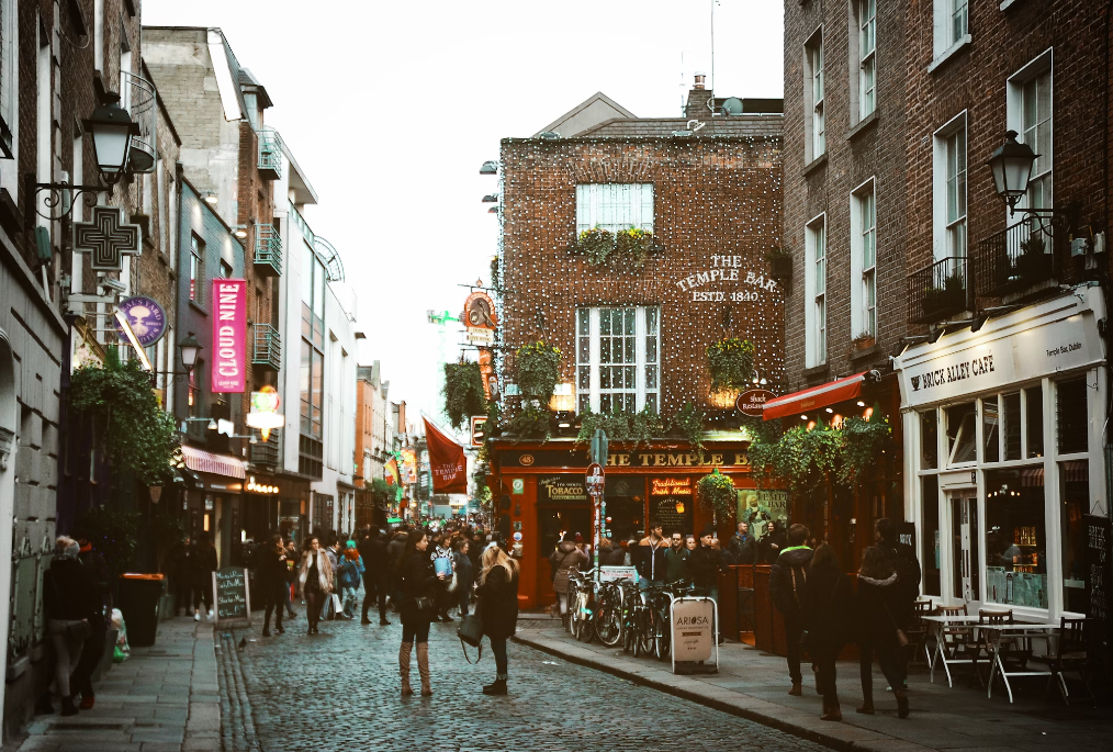 Tourists enjoying Irish festivals and events.
