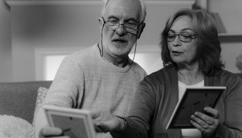 A senior couple looking at Irish family photos