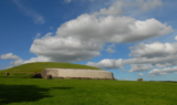 An ancient Irish burial mound on the hills