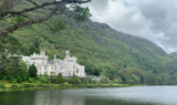 A white castle facing a body of water