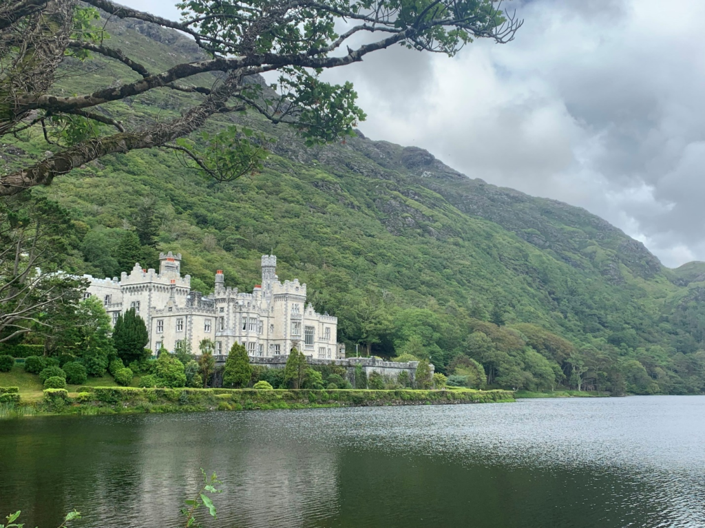 A white castle facing a body of water