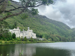 A white castle facing a body of water