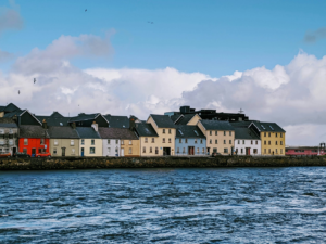 Colourful houses facing a body of water