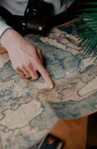 A person looking at a historic map.