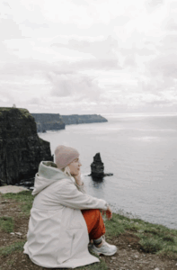A woman exploring Northern Ireland genealogy.