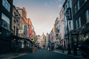 Historic Dublin street leading towards a cathedral, representing the layered history behind Irish ancestry beyond DNA testing.