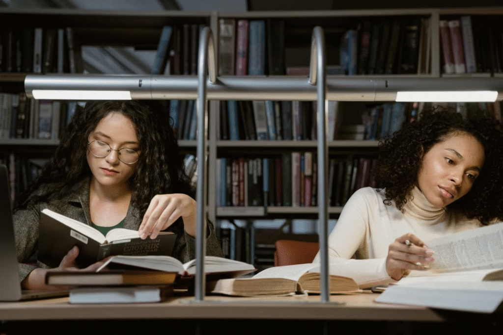 two women doing family history research.