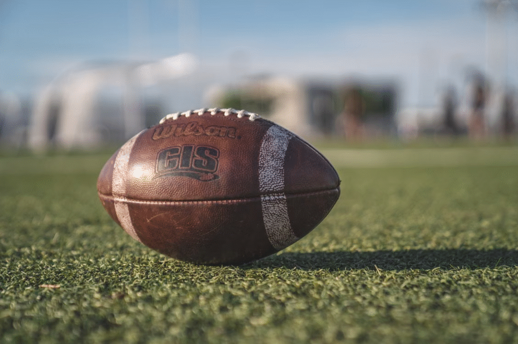 a football on green grass.